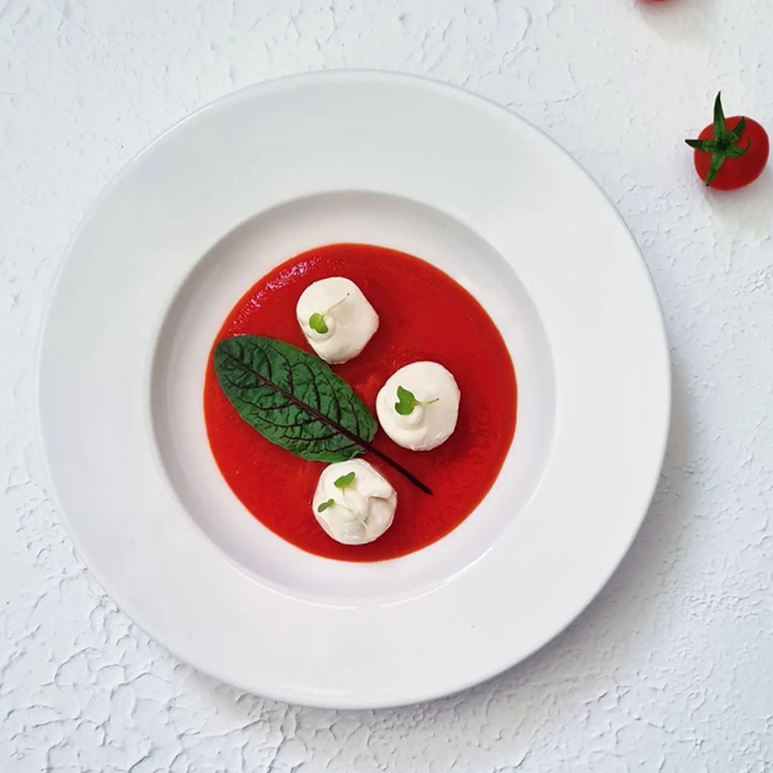 Cherry Tomato soup with freshly crafted Bocconcini, Red Sorrel & Microgreens